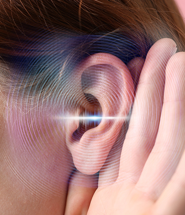 A close-up of a person holding a hand to their ear, with sound wave graphics overlaid to symbolize listening or hearing.